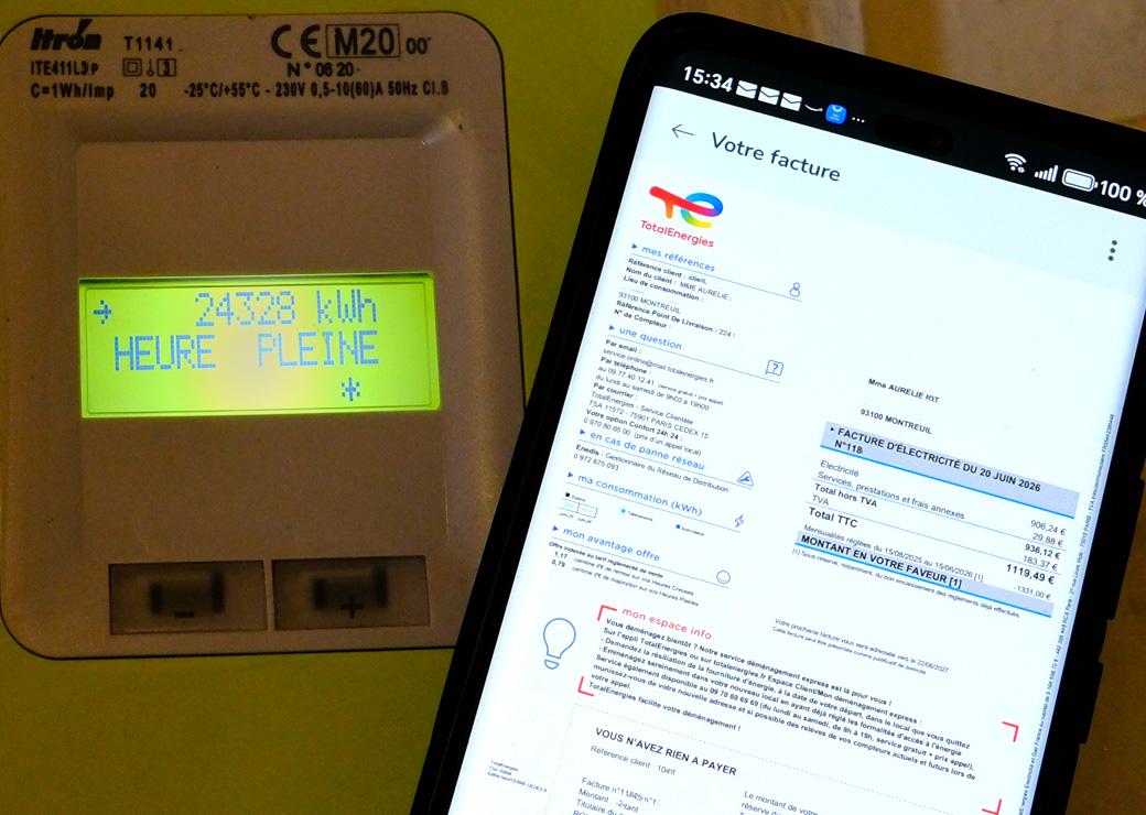 un compteur linky et une facture d'electricité 