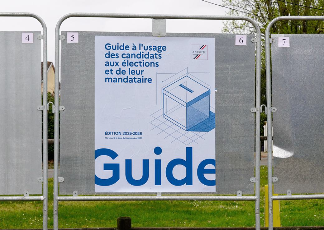 couverture du guide sur un panneau d'affichage d'elections