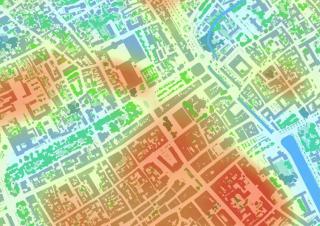 Carte d'une ville avec des zones colorées en rouge, bleu, jaune, orange et vert