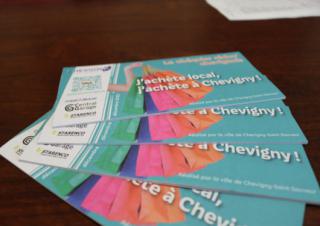 Eventail de carnets de chèques "j'achète local, j'achète à Chévigny"